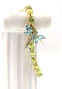 14kt Yellow gold oval peridot bracelet with blue topaz dragonfly