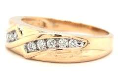 14kt Yellow gold 0.30ctw channel set diamond bypass ring