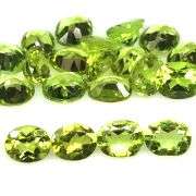Dazzling 8.71ct untreated apple green Peridot set