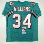 Ricky Williams Autographed Football Jersey with Authentication