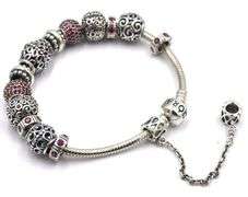 Pandora bracelet with red charms