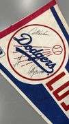 One very rare Los Angeles Dogers Pennant, signed by 5 players