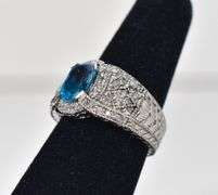 Sparkling 14K White Gold Blue Topaz Gemstone Ring with Diamond Accents