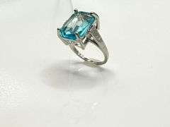14 Kt White Gold Plate 6.5 Ct Simulated Sky Blue Topaz Ring.