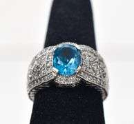 Sparkling 14K White Gold Blue Topaz Gemstone Ring with Diamond Accents