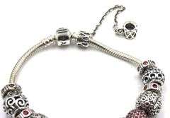 Pandora bracelet with red charms