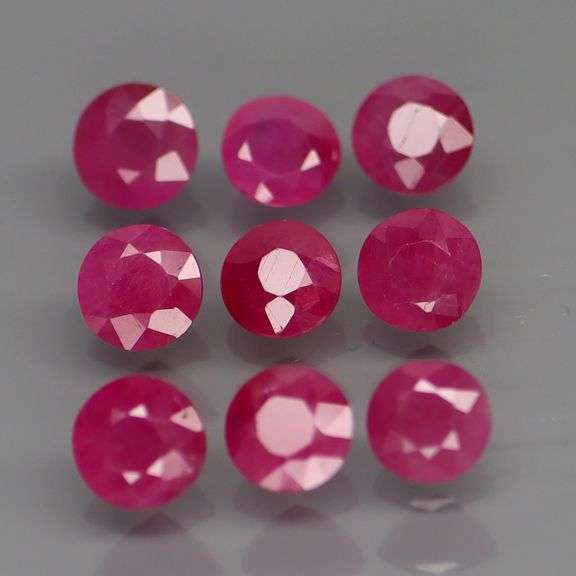 Lovely color in this heavy 3.65ct violet red Ruby set!!!
