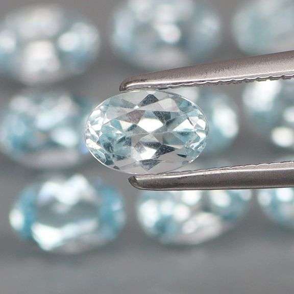 Why aren't you sparkling yet? Get this 8.08ct blue Topaz set!
