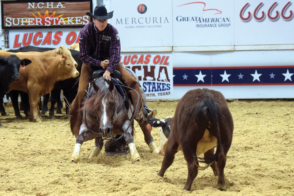 Stevie Rey Von cutting at the 2018 NCHA Super Stakes.