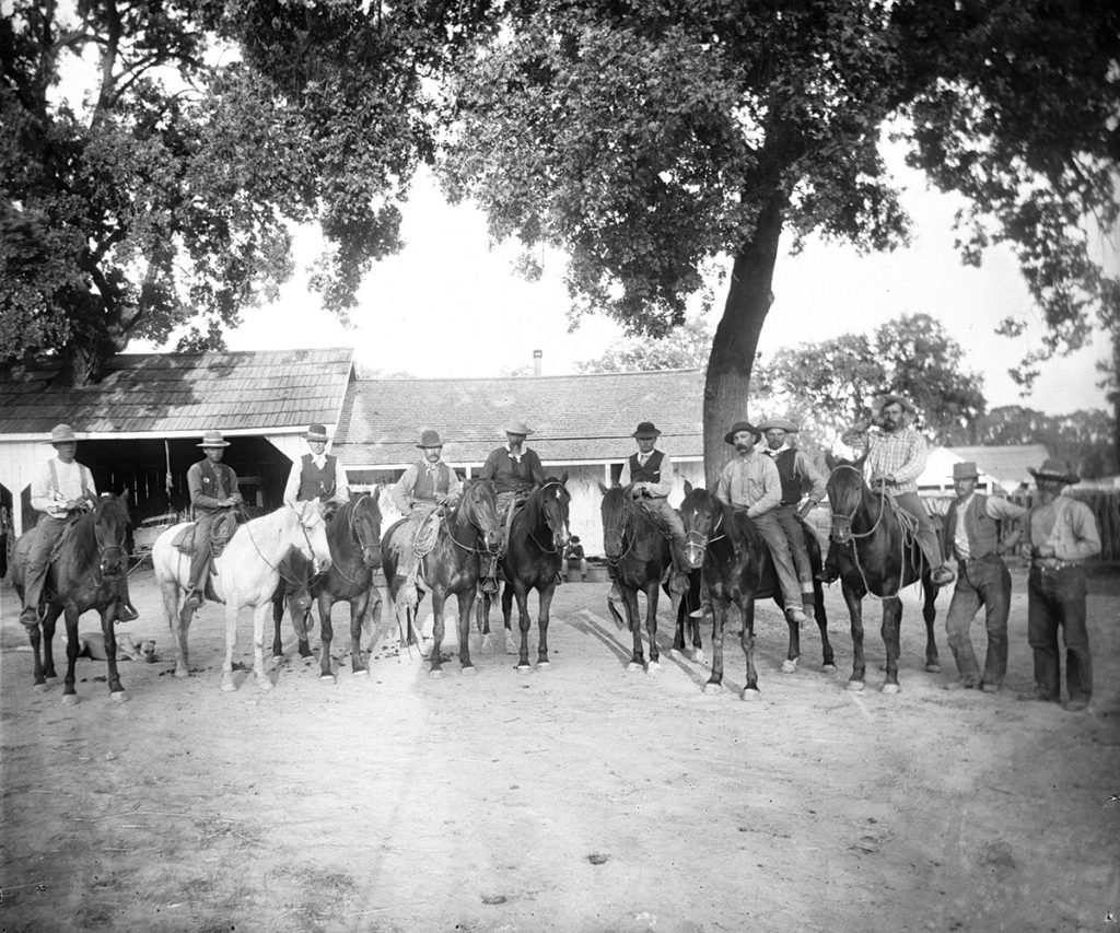 A photo of cowboys from history.