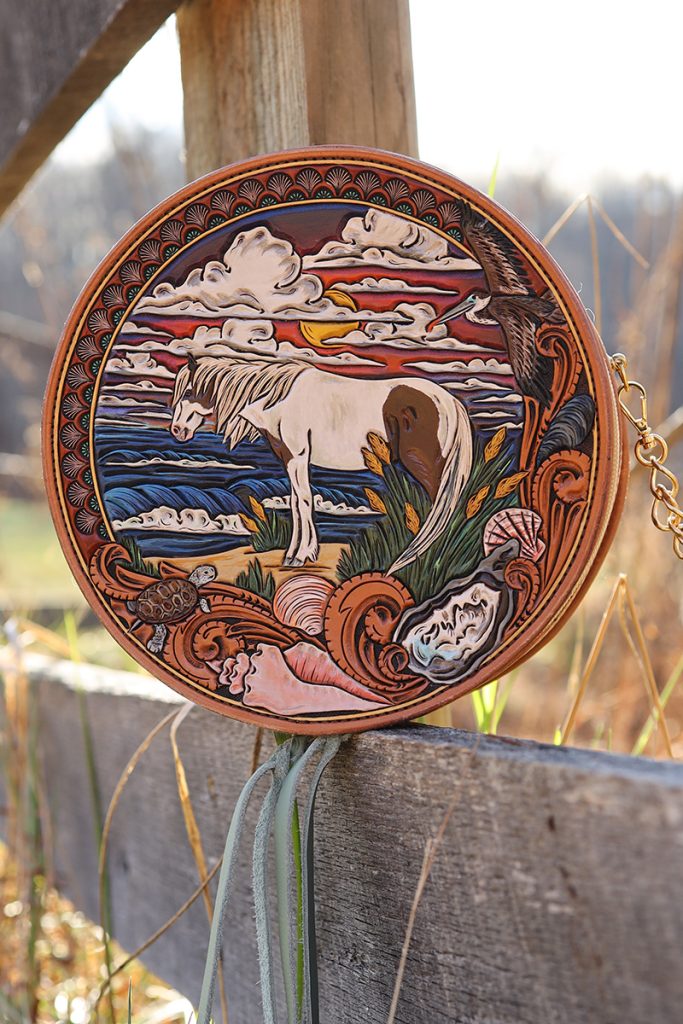 A leather stitching design featuring a Chincoteague Pony.