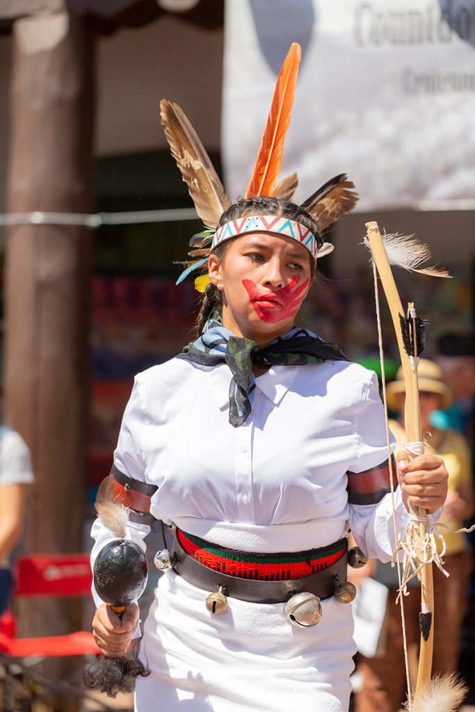 A Native American performing at the Santa Fe Indian Market.