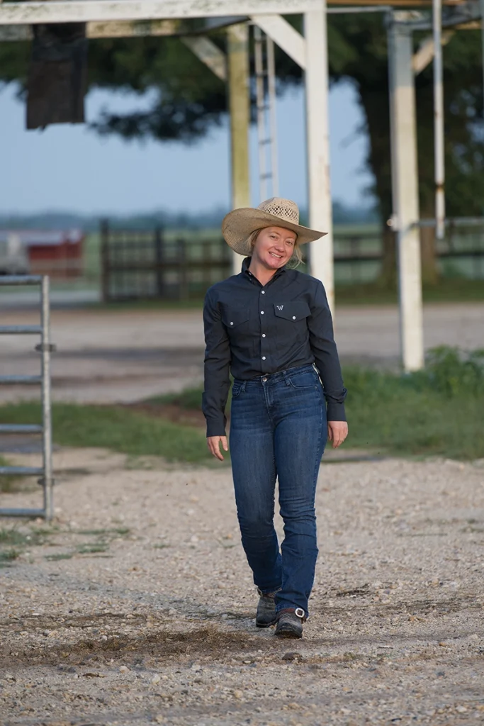 A cowgirl modeling a Cowboy Ware shirt.