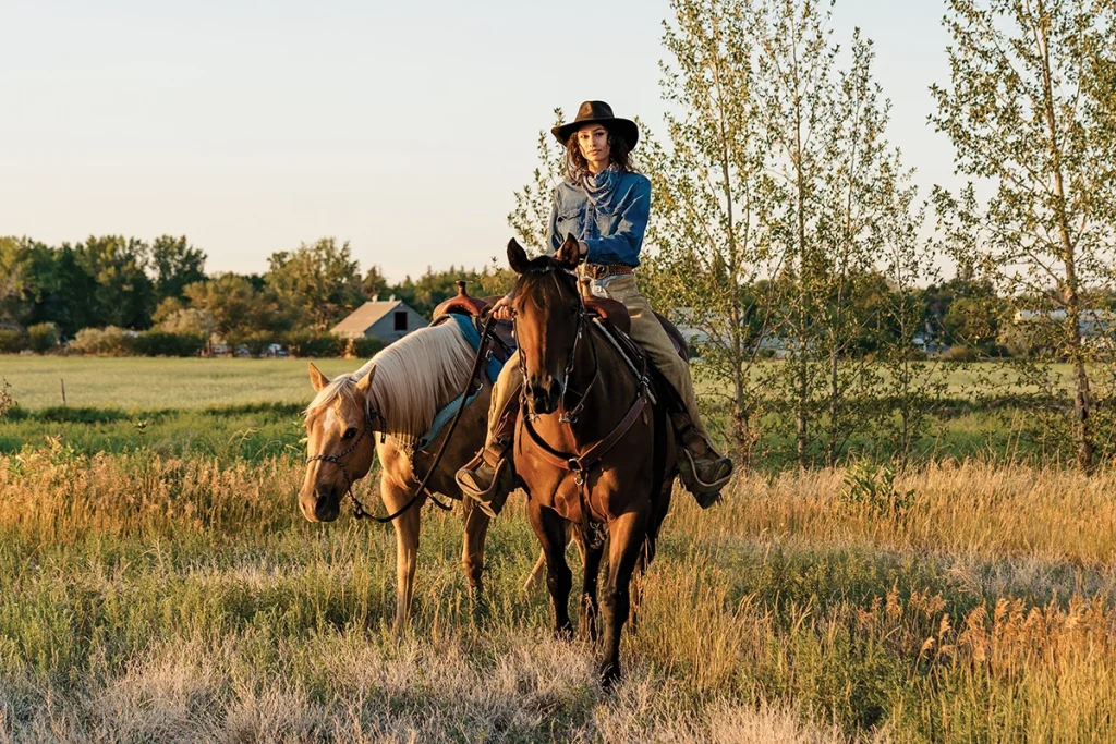 Ponying a horse.