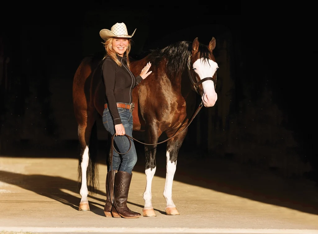 Michell Anne Kimball and her beloved horse.