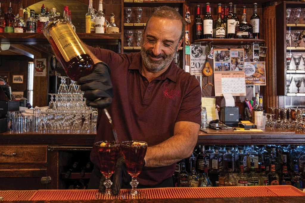 Scotty Ygoa making a Picon Punch.
