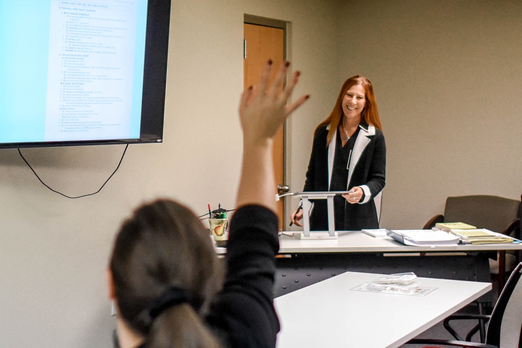 imse instructor at desk
