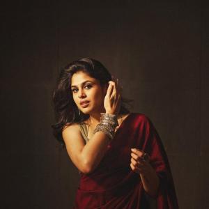 Actress Faria Abdullah in a Red Saree with Traditional Jewelry