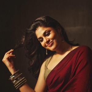 Actress Faria Abdullah in a Red Saree with Traditional Jewelry