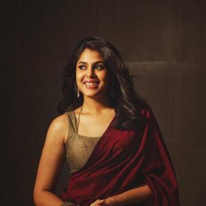 Actress Faria Abdullah in a Red Saree with Traditional Jewelry