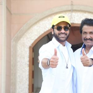 Actor Sharwanand Casual Style with Sunglasses and Yellow Cap