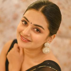 Actress Esther Anil Shines In Stylish Black Saree Look