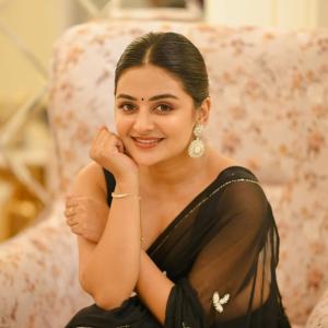Actress Esther Anil Shines In Stylish Black Saree Look