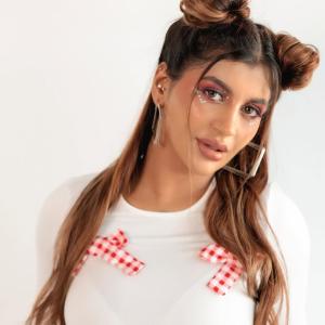 Actress Yashika Anand Looks Trendy In White And Red Style