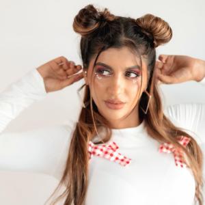 Actress Yashika Anand Looks Trendy In White And Red Style