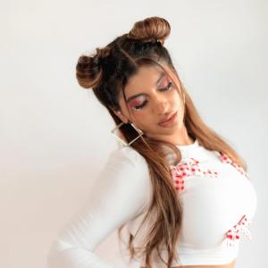 Actress Yashika Anand Looks Trendy In White And Red Style