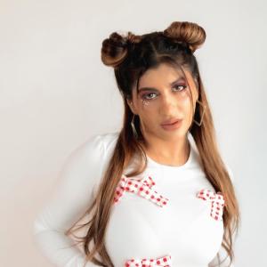 Actress Yashika Anand Looks Trendy In White And Red Style