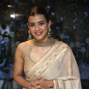 Elegant Cultural Fashion Inspiration by Actress Hebbah Patel  in Golden Saree