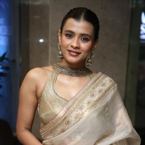 Elegant Cultural Fashion Inspiration by Actress Hebbah Patel  in Golden Saree