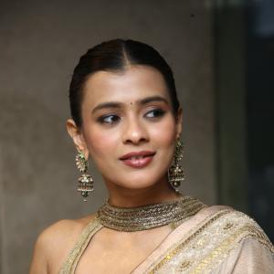 Elegant Cultural Fashion Inspiration by Actress Hebbah Patel  in Golden Saree