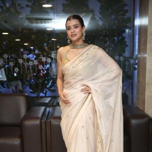 Elegant Cultural Fashion Inspiration by Actress Hebbah Patel  in Golden Saree