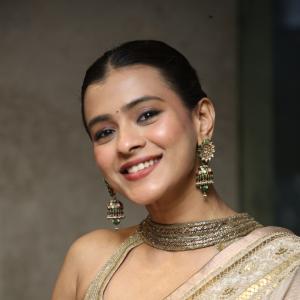 Elegant Cultural Fashion Inspiration by Actress Hebbah Patel  in Golden Saree