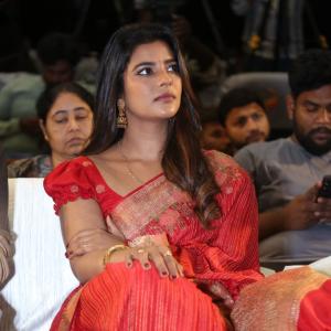 Actress Aishwarya Rajesh glows in traditional red saree