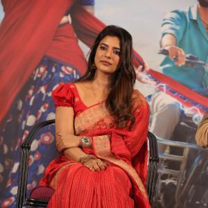 Actress Aishwarya Rajesh glows in traditional red saree