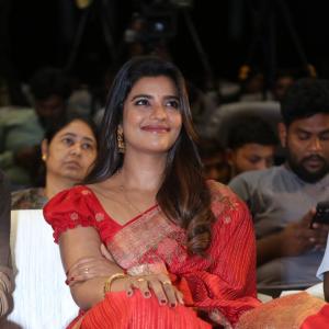 Actress Aishwarya Rajesh glows in traditional red saree