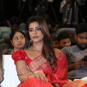 Actress Aishwarya Rajesh glows in traditional red saree