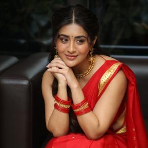 Raashi Singh Looks Radiant in Red Saree and Gold Jewellery