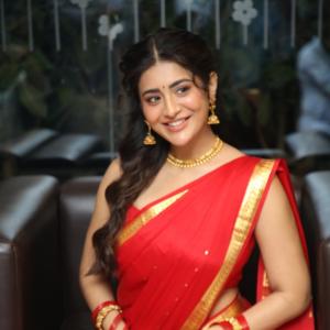 Raashi Singh Looks Radiant in Red Saree and Gold Jewellery