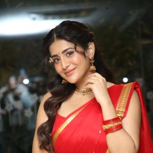 Raashi Singh Looks Radiant in Red Saree and Gold Jewellery