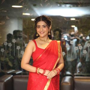 Raashi Singh Looks Radiant in Red Saree and Gold Jewellery