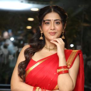 Raashi Singh Looks Radiant in Red Saree and Gold Jewellery