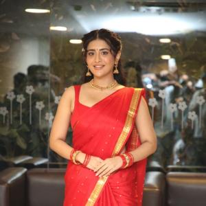 Raashi Singh Looks Radiant in Red Saree and Gold Jewellery