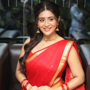 Raashi Singh Looks Radiant in Red Saree and Gold Jewellery