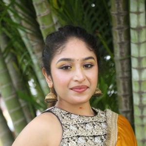 Aria Menon Charms in a Bright Yellow Ethnic Ensemble