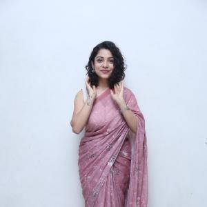 Classic Cultural Style of Actress Varsha Bollamma in a Floral Pink Saree