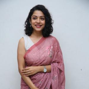 Classic Cultural Style of Actress Varsha Bollamma in a Floral Pink Saree